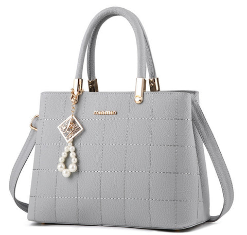 Designer Style Hair Ball Handbags with Strap
