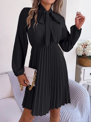 Spring and summer temperament tied waist long sleeved pleated skirt
